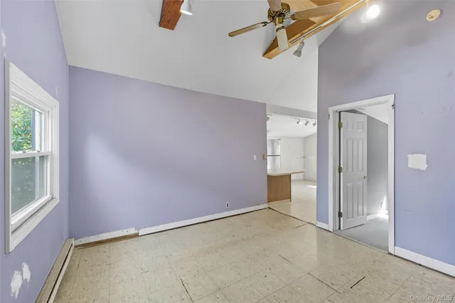 an empty room with windows