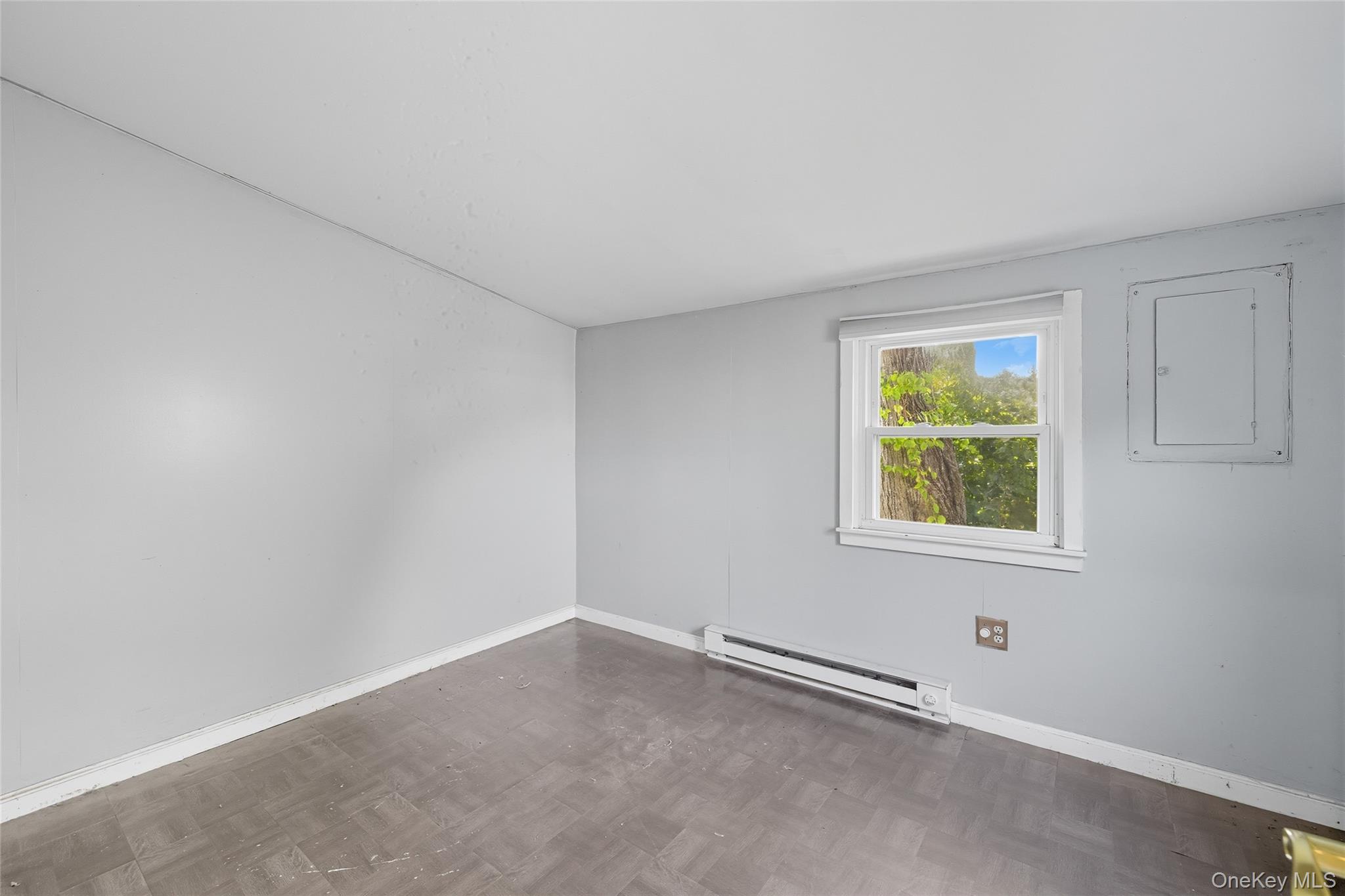 13 Darien Road Carmel, NY 10512 - Photo 6 of 17 an empty room with a window