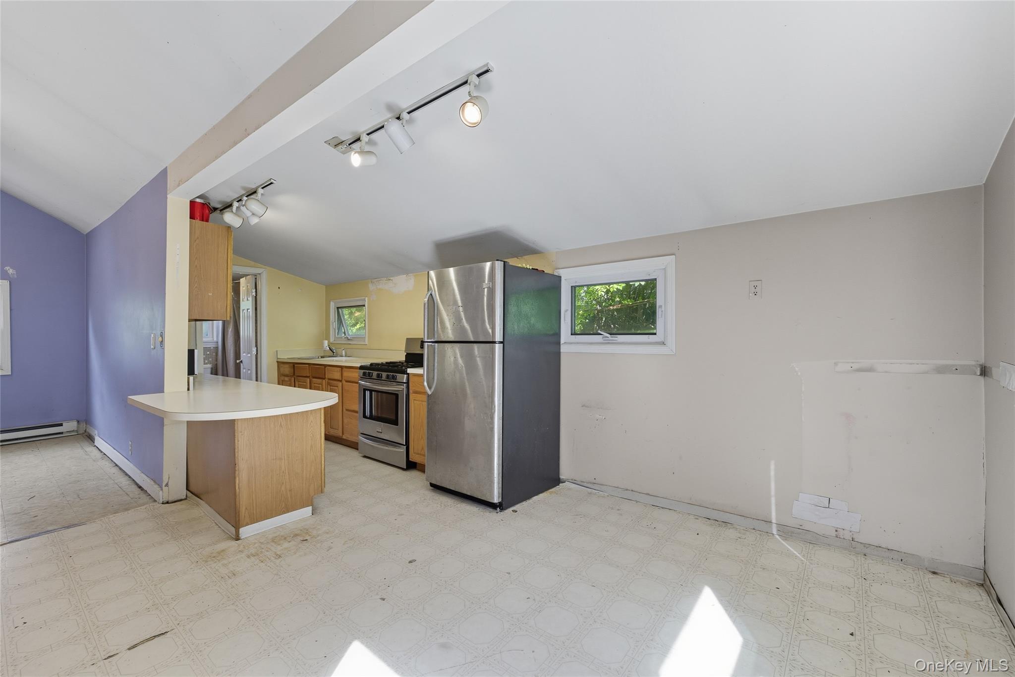13 Darien Road Carmel, NY 10512 - Photo 10 of 17 a view of a kitchen with refrigerator and windows