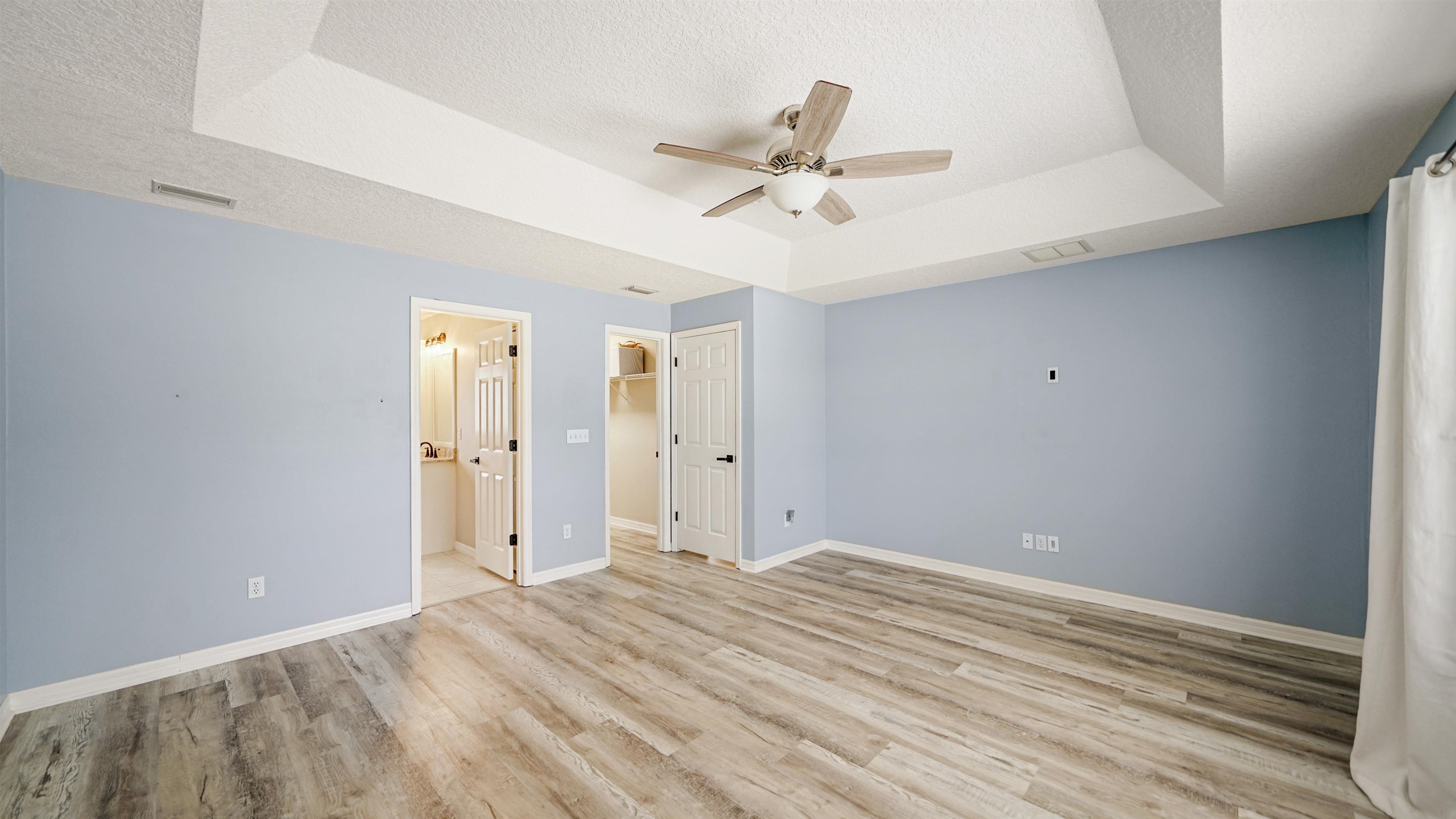 5324 5th Street St. Augustine, FL 32080 - Photo 19 of 49 a view of a livingroom with a ceiling fan