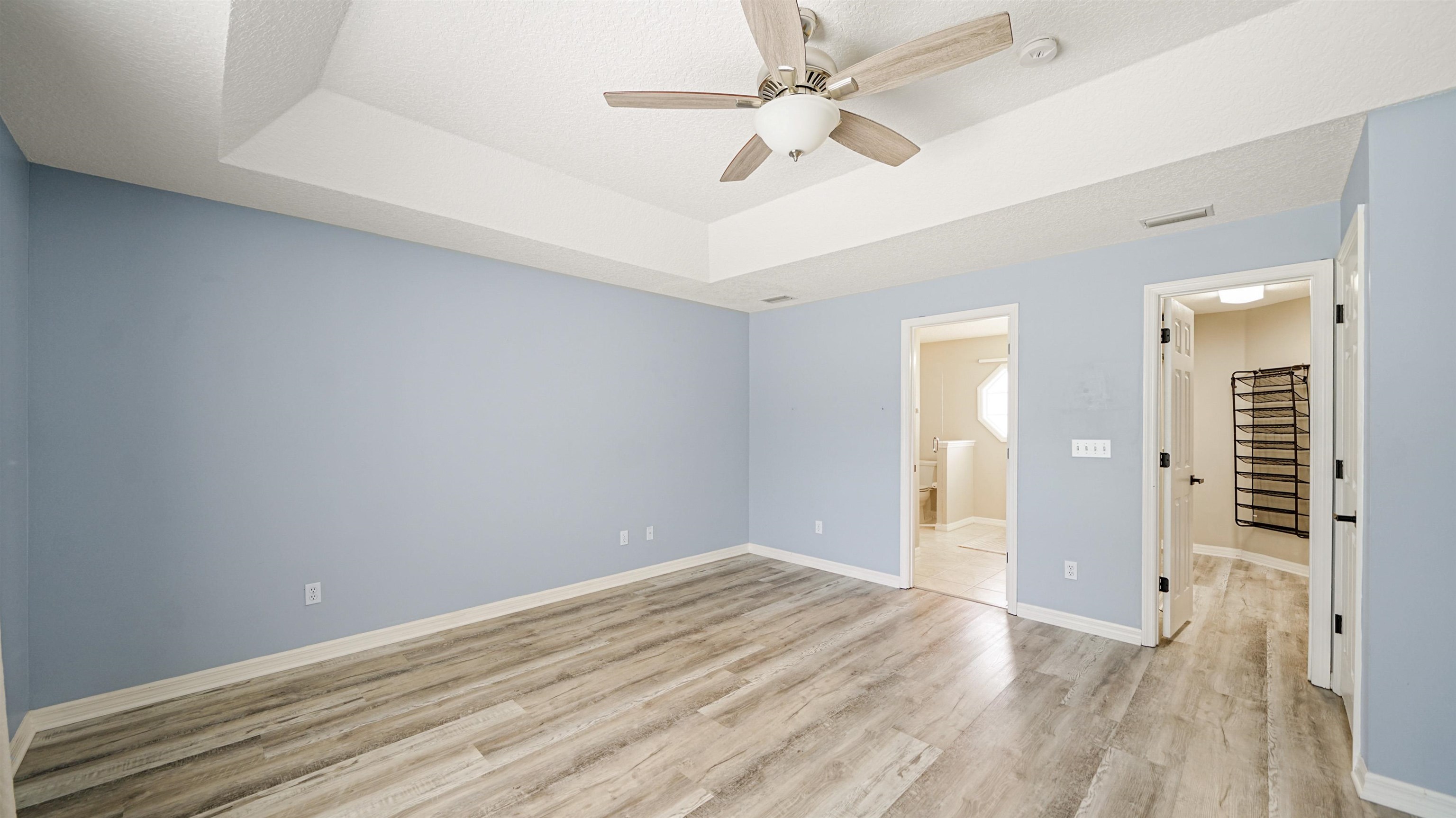 5324 5th Street St. Augustine, FL 32080 - Photo 20 of 49 wooden floor in an empty room with a window