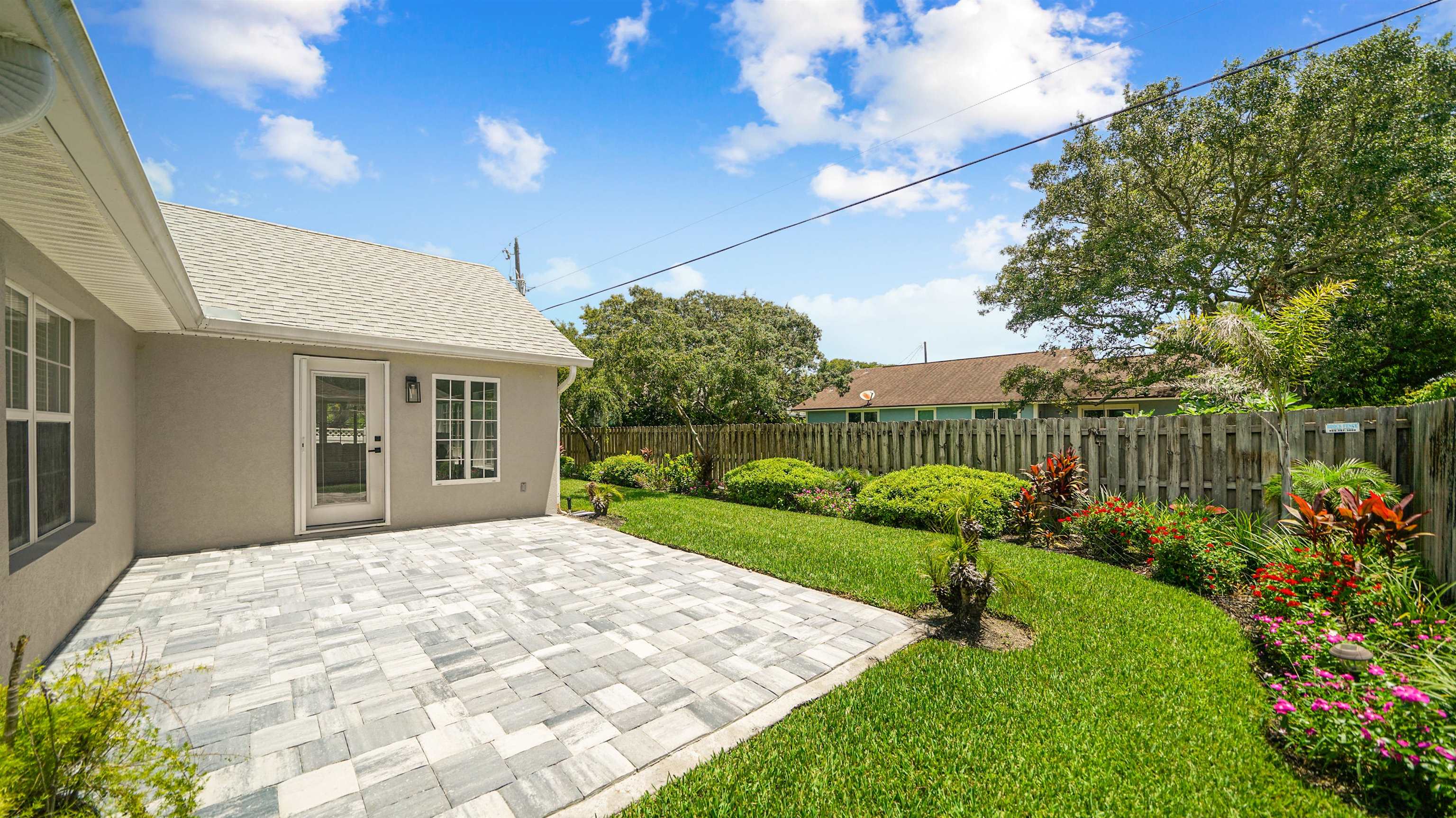 5324 5th Street St. Augustine, FL 32080 - Photo 32 of 49 a front view of a house with garden