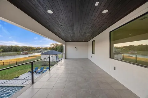 a view of a lake with a yard