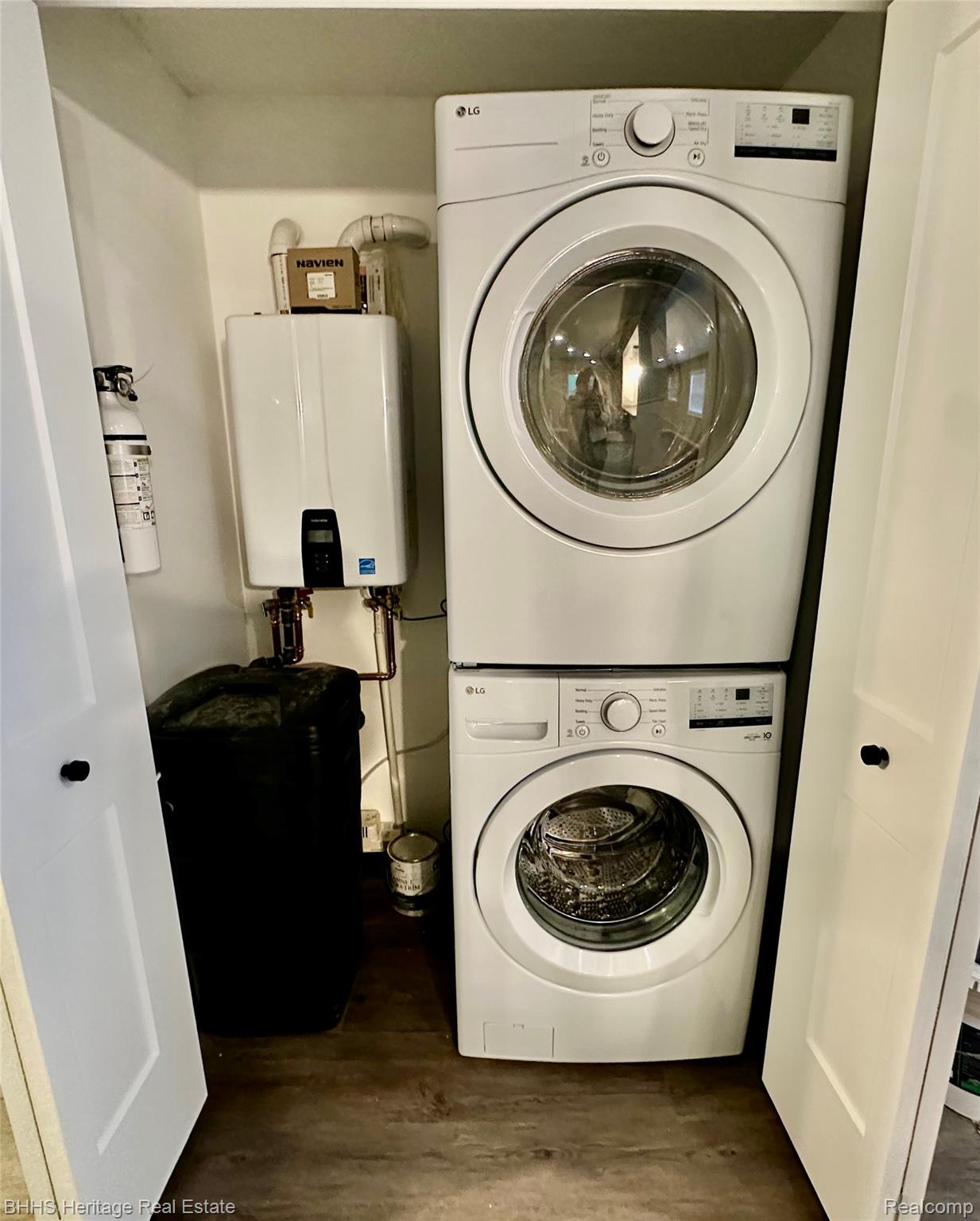 5435 Byron Road Howell, MI 48855 - Photo 9 of 30 1st floor laundry tankless water heater