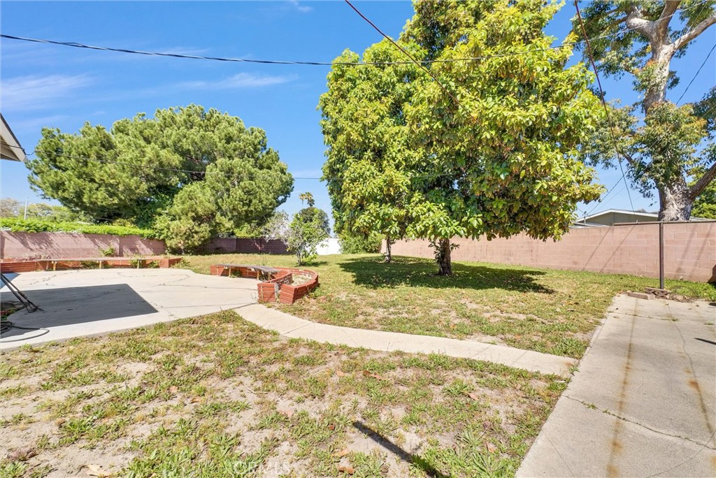 2551 Rome Avenue Anaheim, CA 92804 - Photo 26 of 27 a view of a yard with an tree