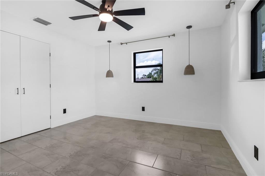 18659 Sarasota Road Fort Myers, FL 33967 - Photo 11 of 19 a view of an empty room with a window
