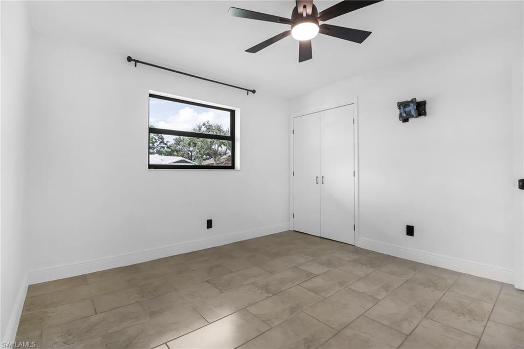18659 Sarasota Road Fort Myers, FL 33967 - Photo 17 of 19 a view of an empty room with a window