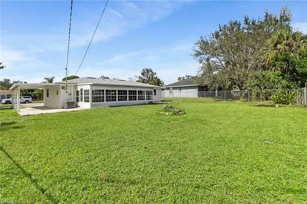a view of a house with a big yard