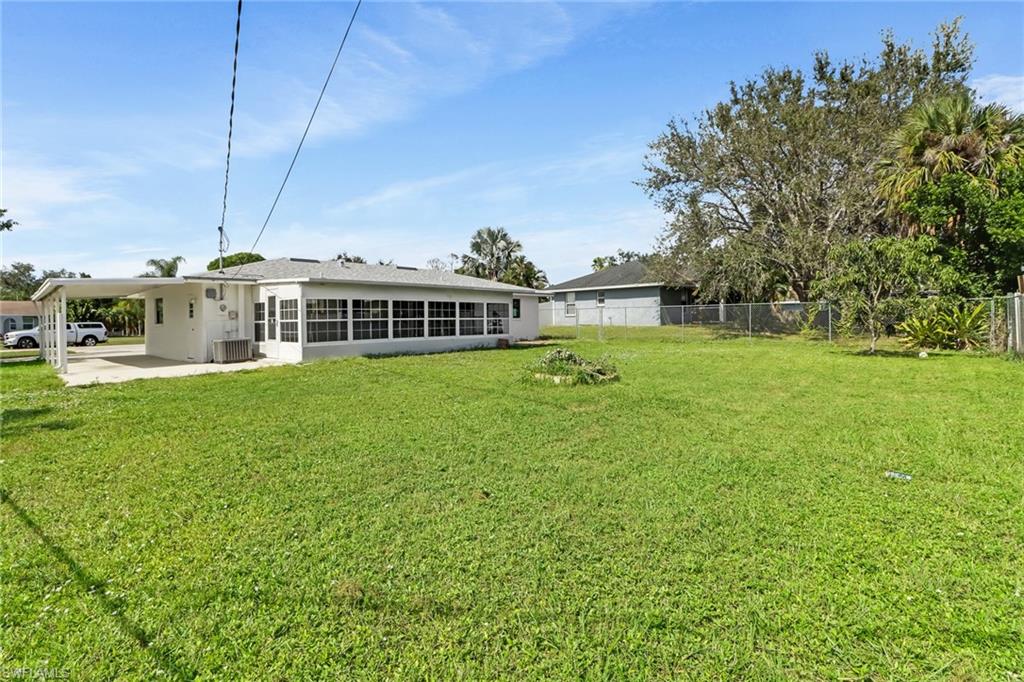 18659 Sarasota Road Fort Myers, FL 33967 - Photo 2 of 19 a view of a house with a big yard