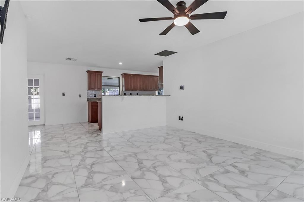 18659 Sarasota Road Fort Myers, FL 33967 - Photo 5 of 19 a view of a kitchen with a stove