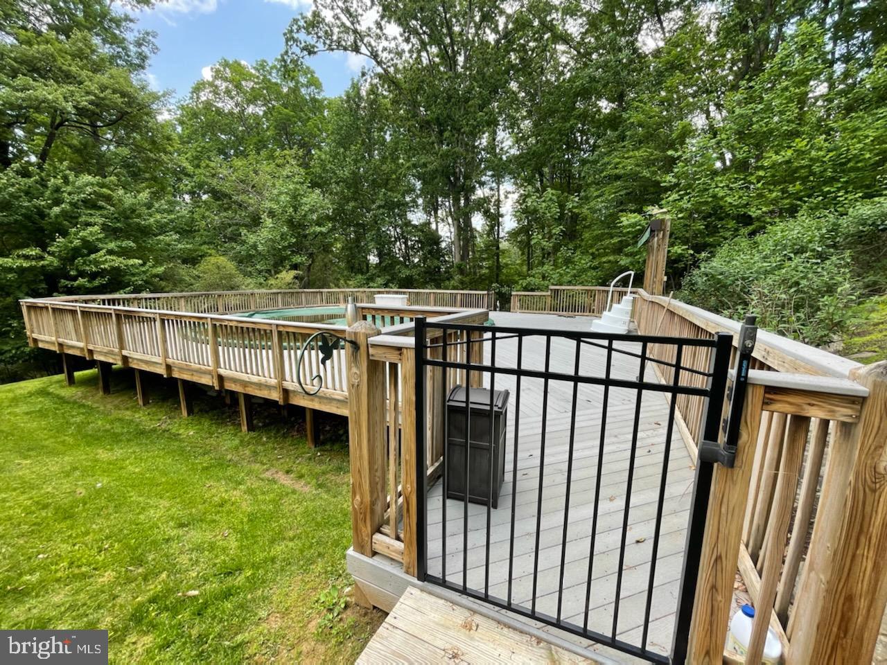 10267 Stillhouse Road Delaplane, VA 20144 - Photo 53 of 62 Pool area with gate and fencing
