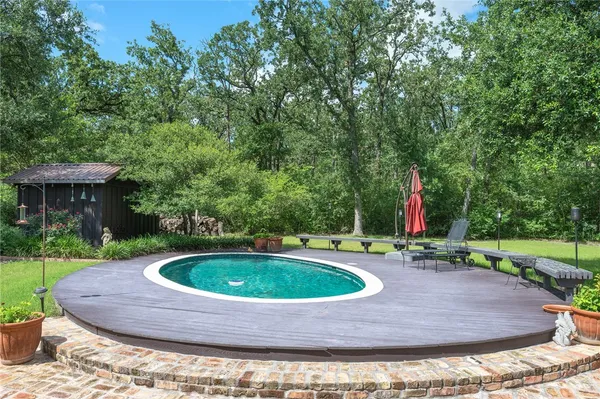 a view of outdoor space yard and swimming pool