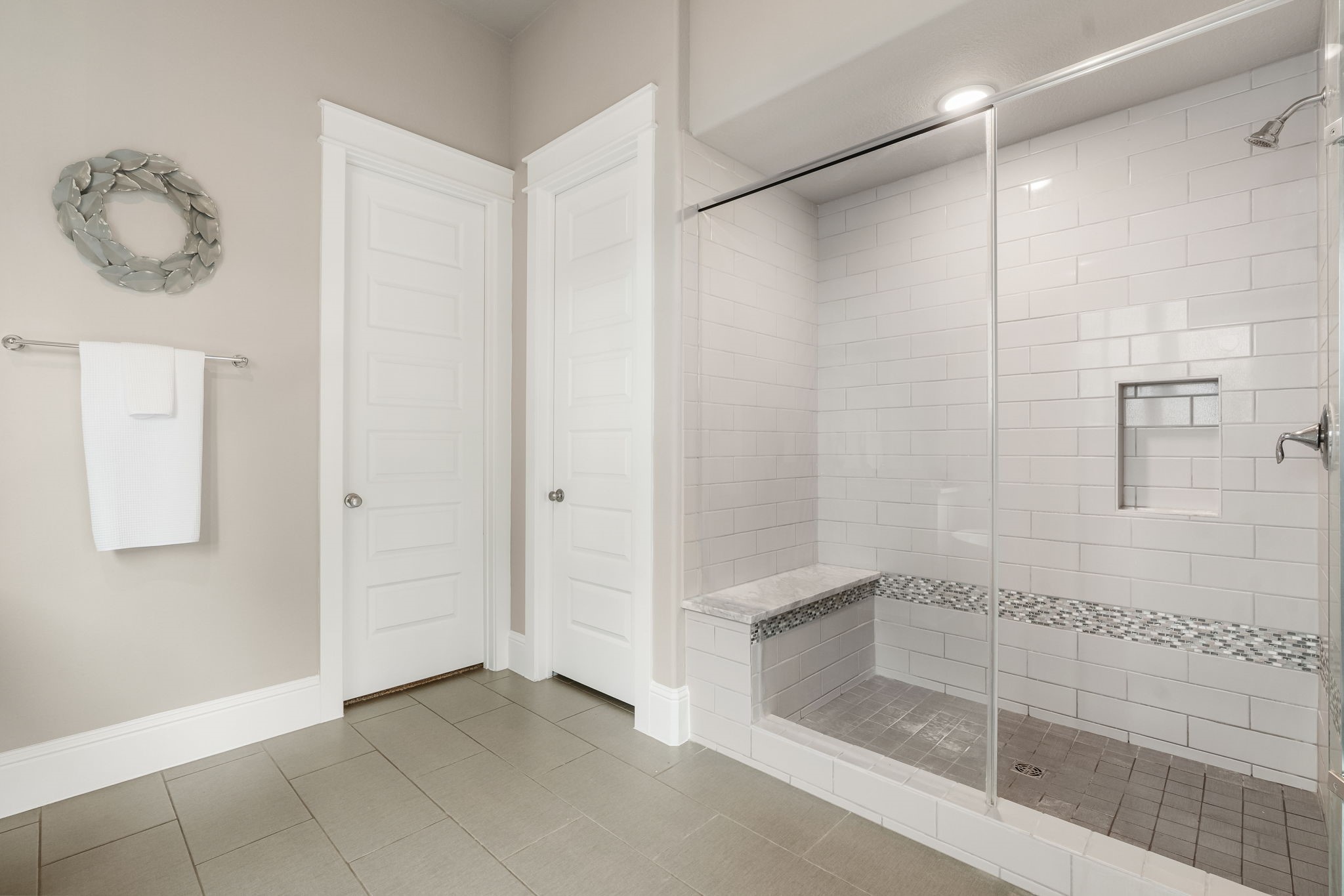 2206 Rope Maker Road Conroe, TX 77384 - Photo 35 of 42 Oversized walk-in shower with bench seating.