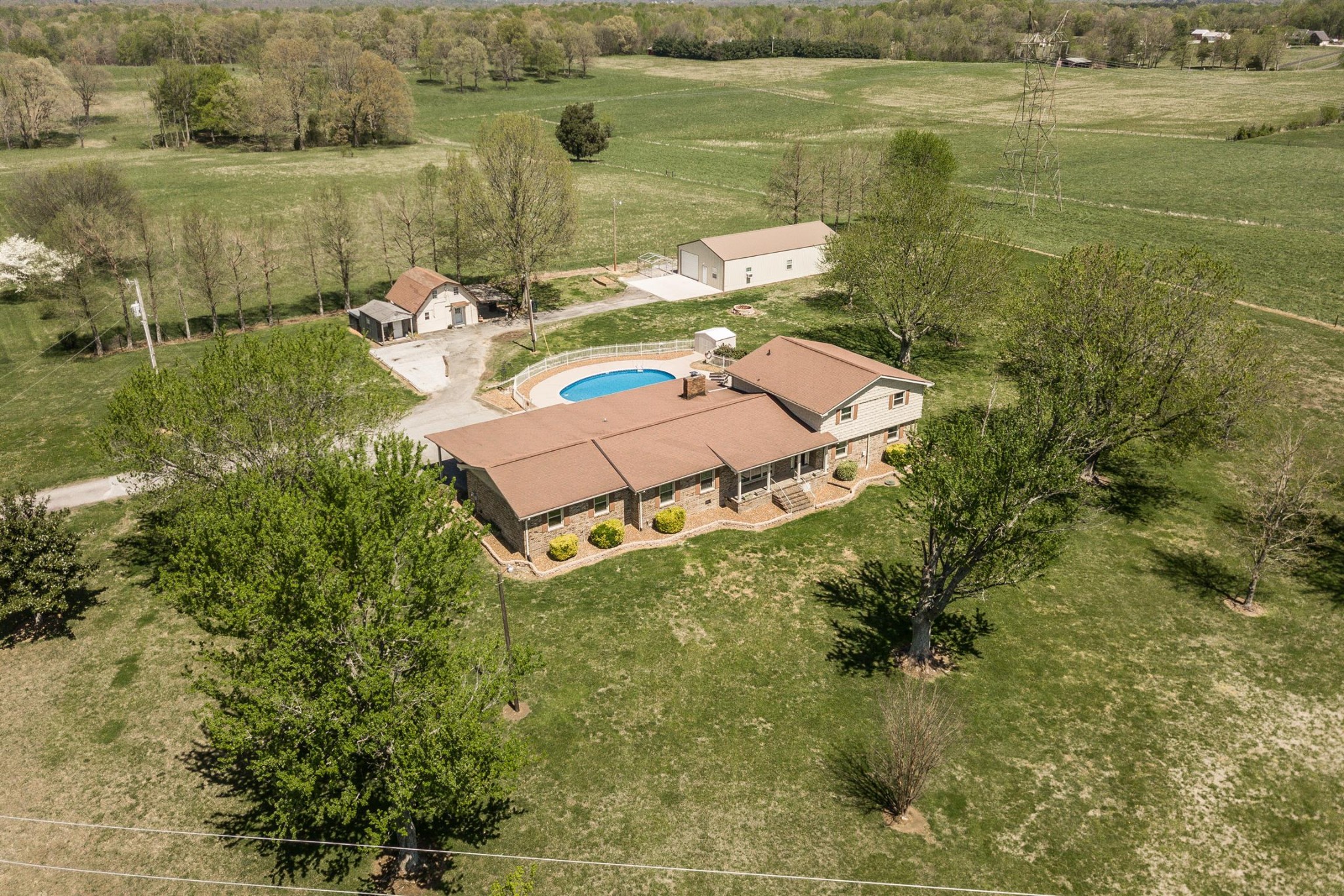 6842 Bethel Road Greenbrier, TN 37073 - Photo 1 of 30 a view of a lake with a yard