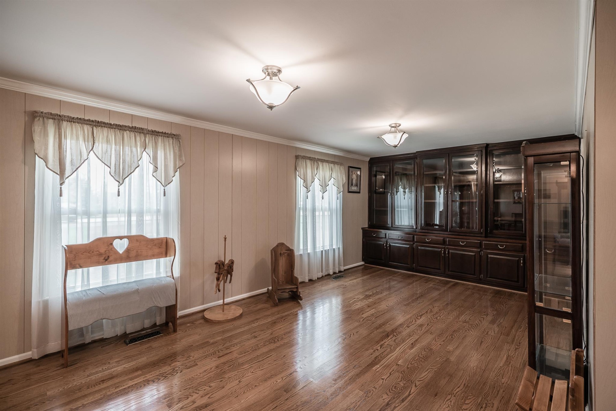 6842 Bethel Road Greenbrier, TN 37073 - Photo 16 of 30 a view of an empty room with a window and wooden floor