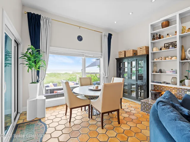 a kitchen with stainless steel appliances granite countertop a stove and a wooden floors