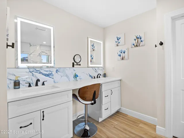 a living room with furniture a rug and a table