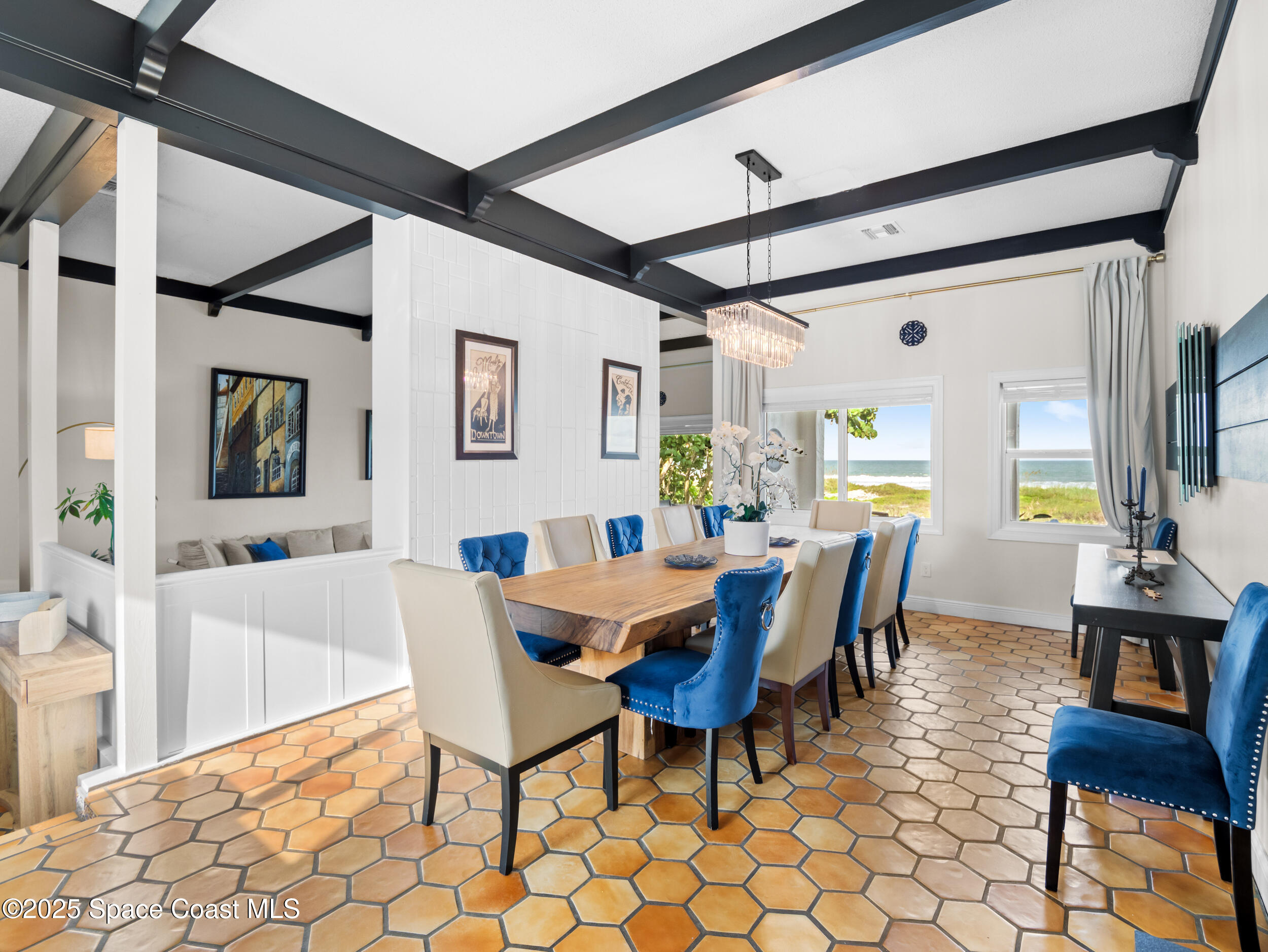 933 South Atlantic Avenue Cocoa Beach, FL 32931 - Photo 28 of 46 a view of a dining room with furniture and window