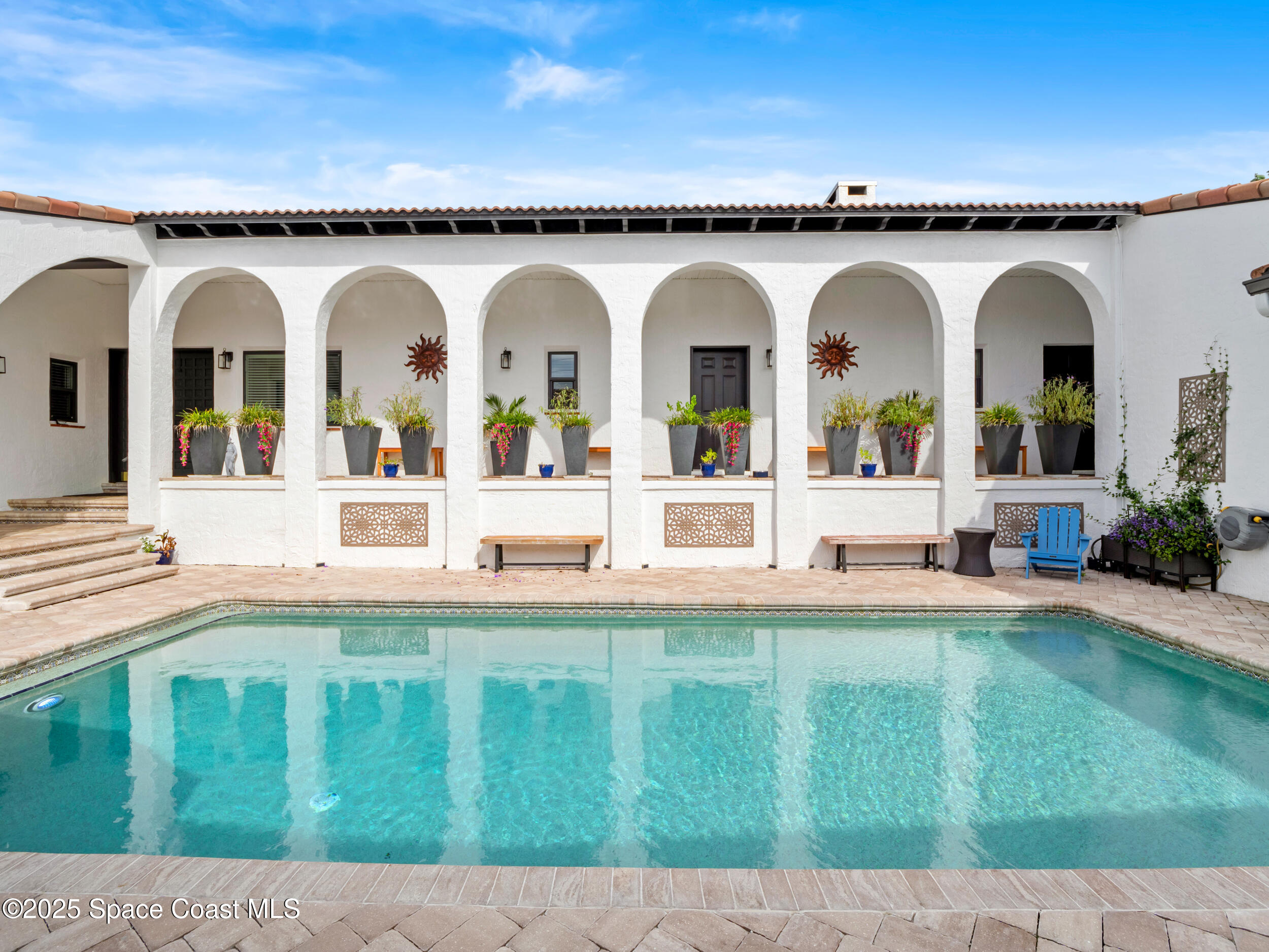933 South Atlantic Avenue Cocoa Beach, FL 32931 - Photo 4 of 46 a view of swimming pool with outdoor seating