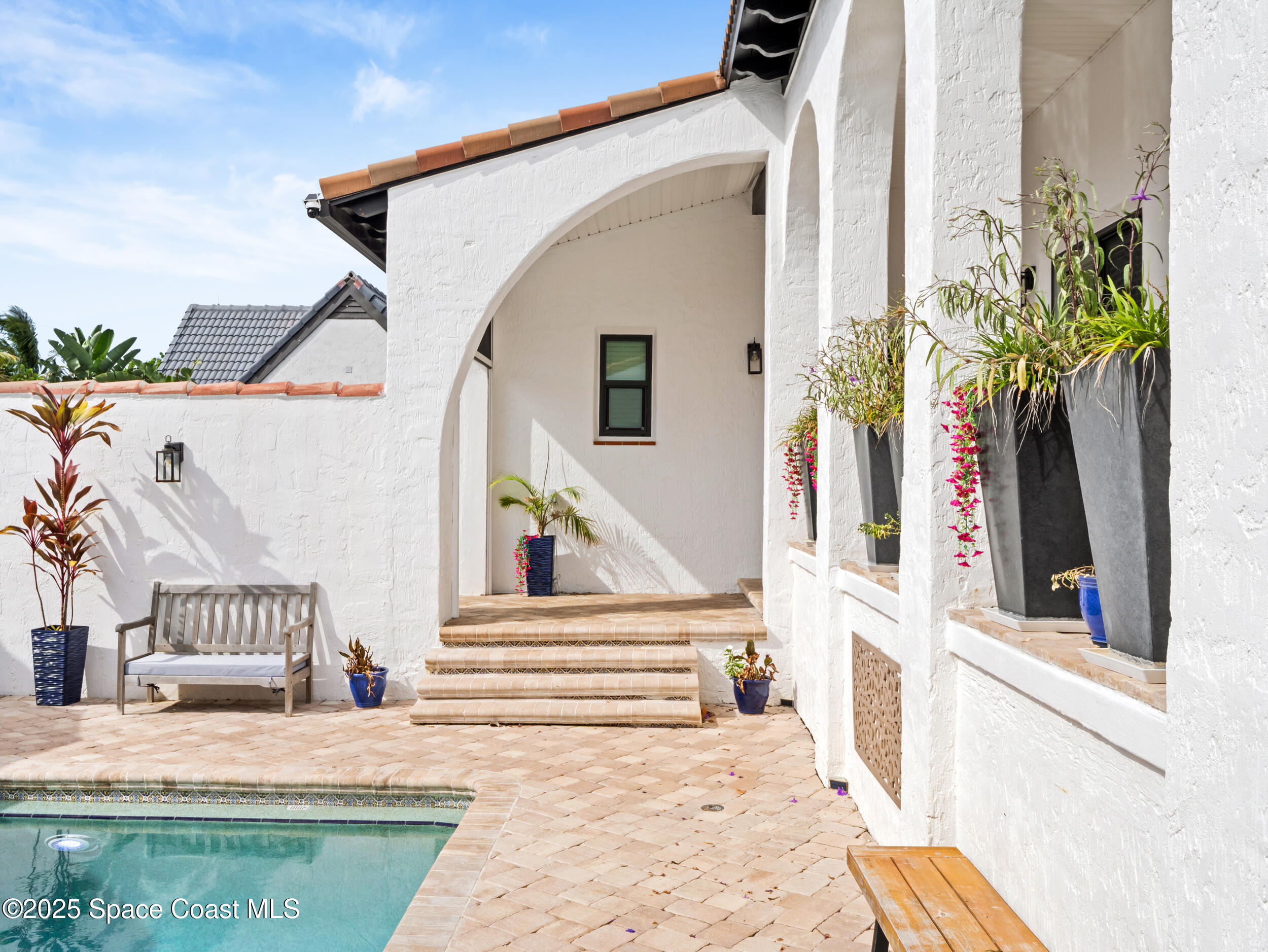 933 South Atlantic Avenue Cocoa Beach, FL 32931 - Photo 7 of 46 a view of entryway with a front door