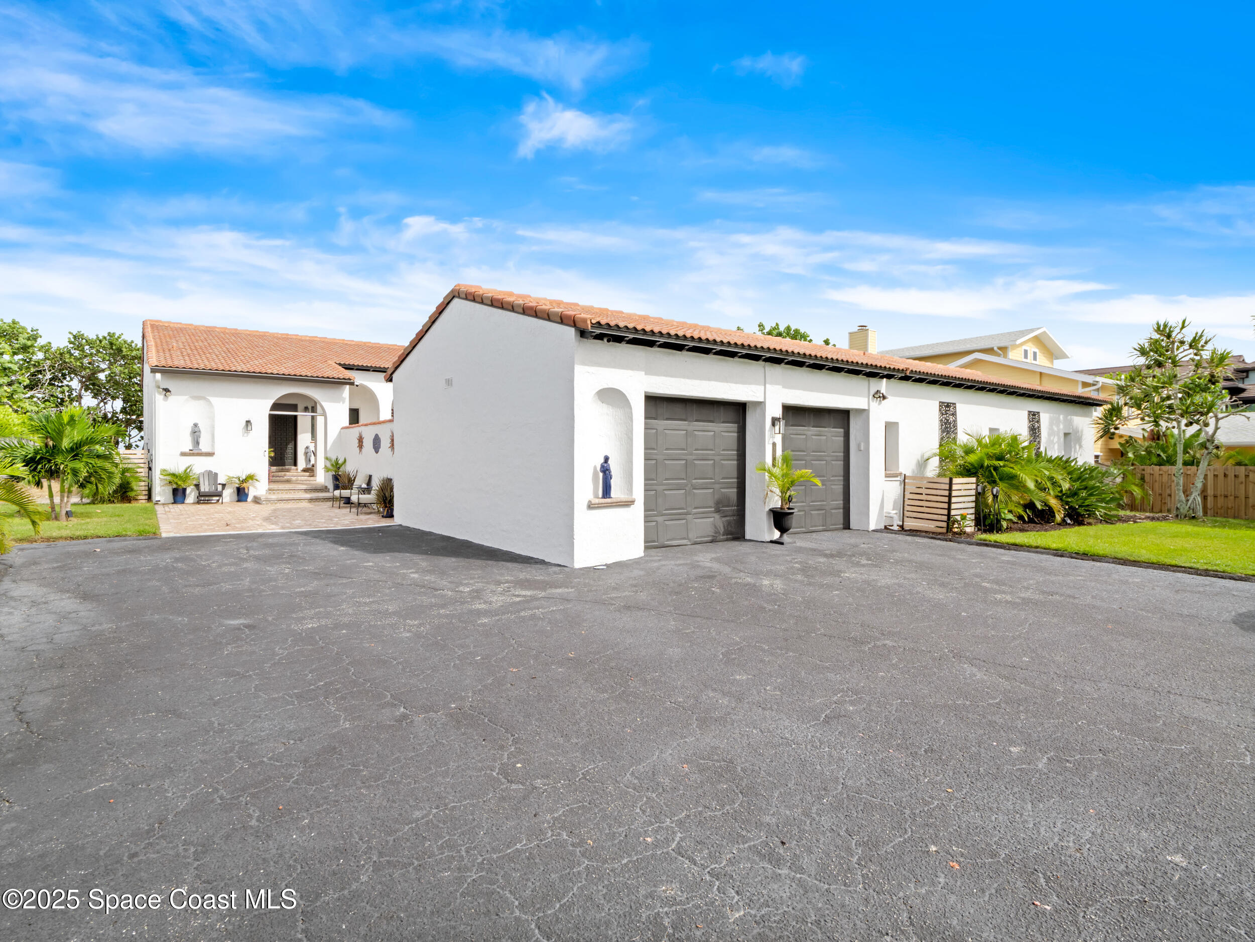 933 South Atlantic Avenue Cocoa Beach, FL 32931 - Photo 9 of 46 a view of a house with a street