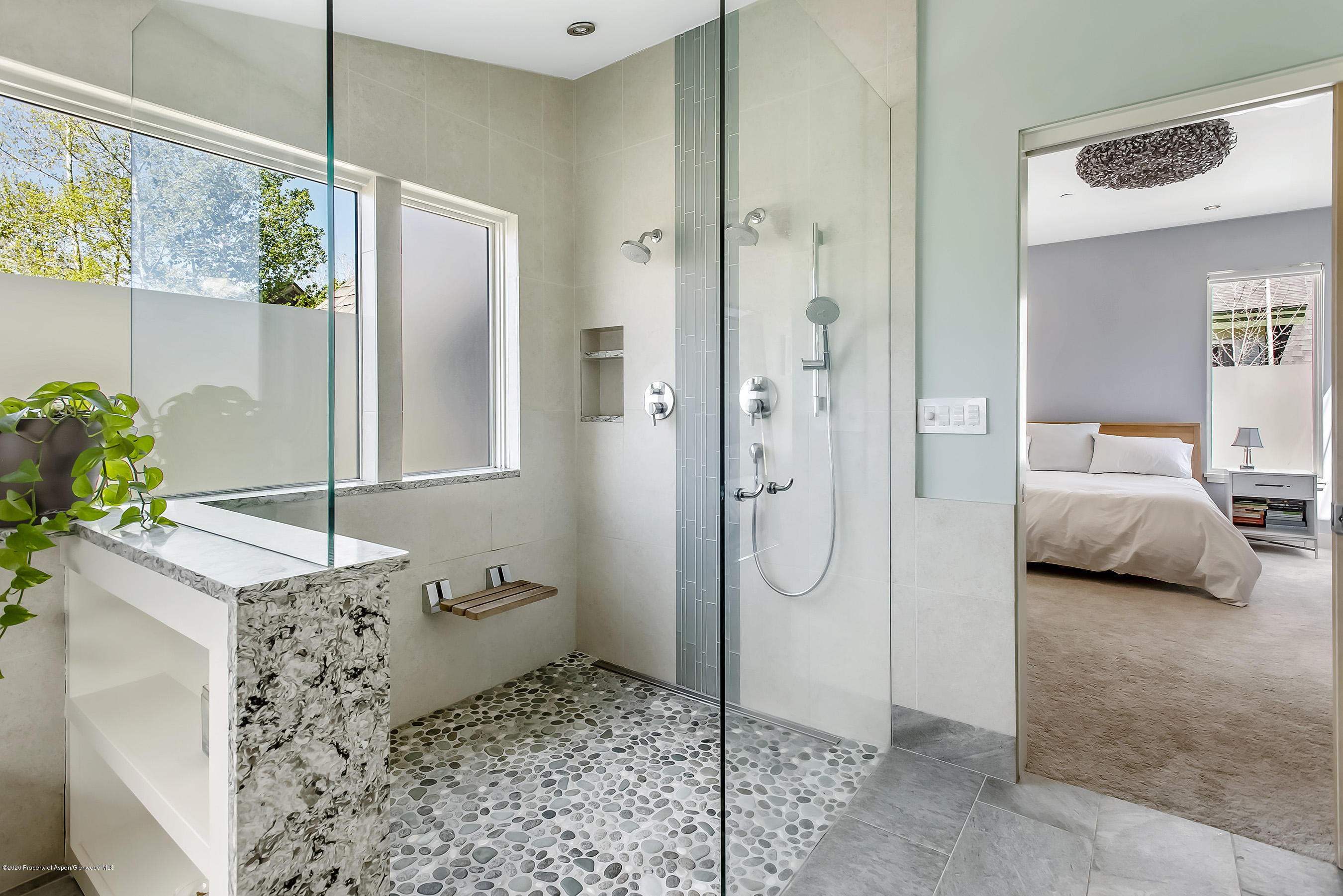 80 Riverdown Drive Aspen, CO 81611 - Photo 15 of 31 a en suite bathroom with a granite countertop shower and a sink