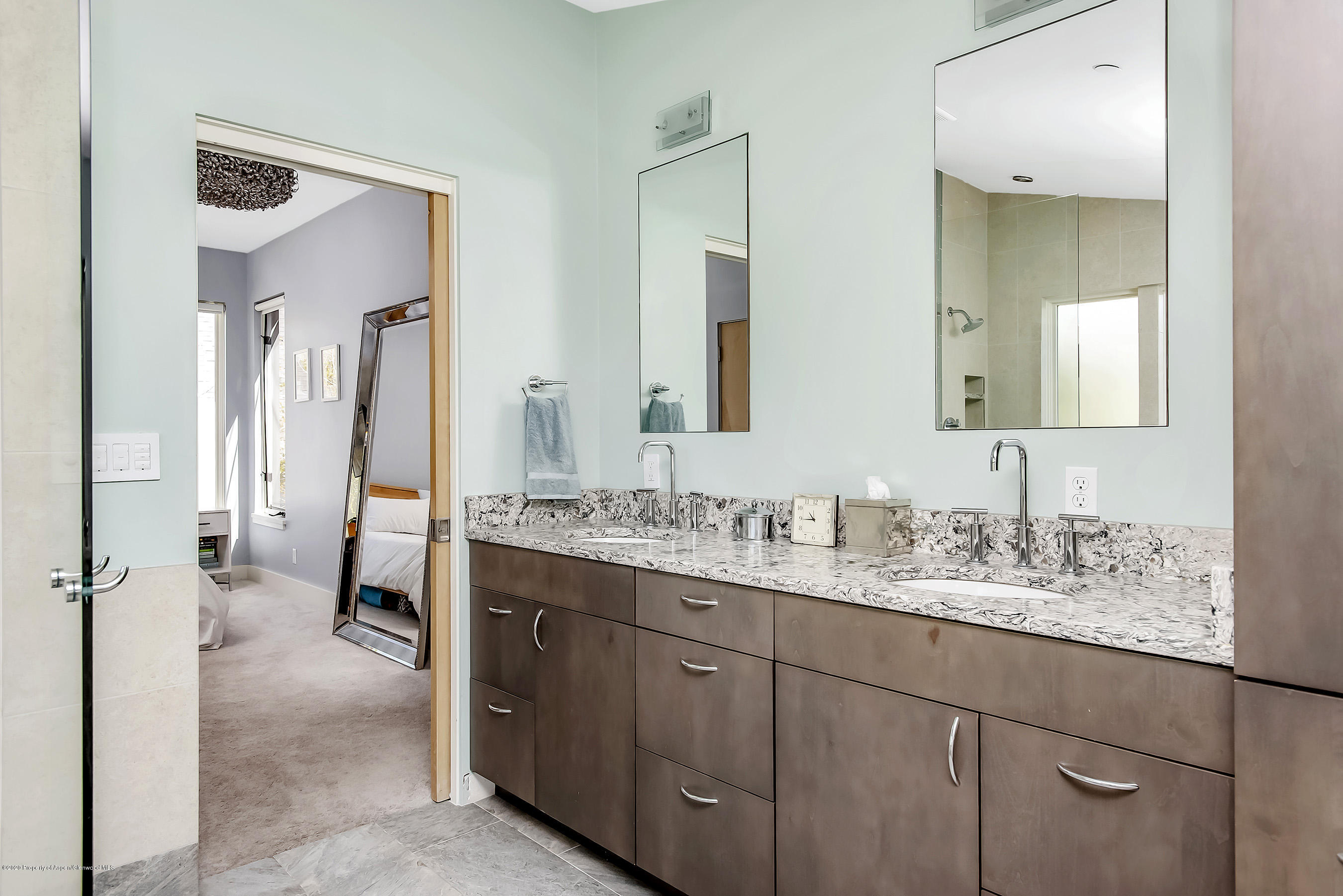 80 Riverdown Drive Aspen, CO 81611 - Photo 18 of 31 a bathroom with a sink and a mirror
