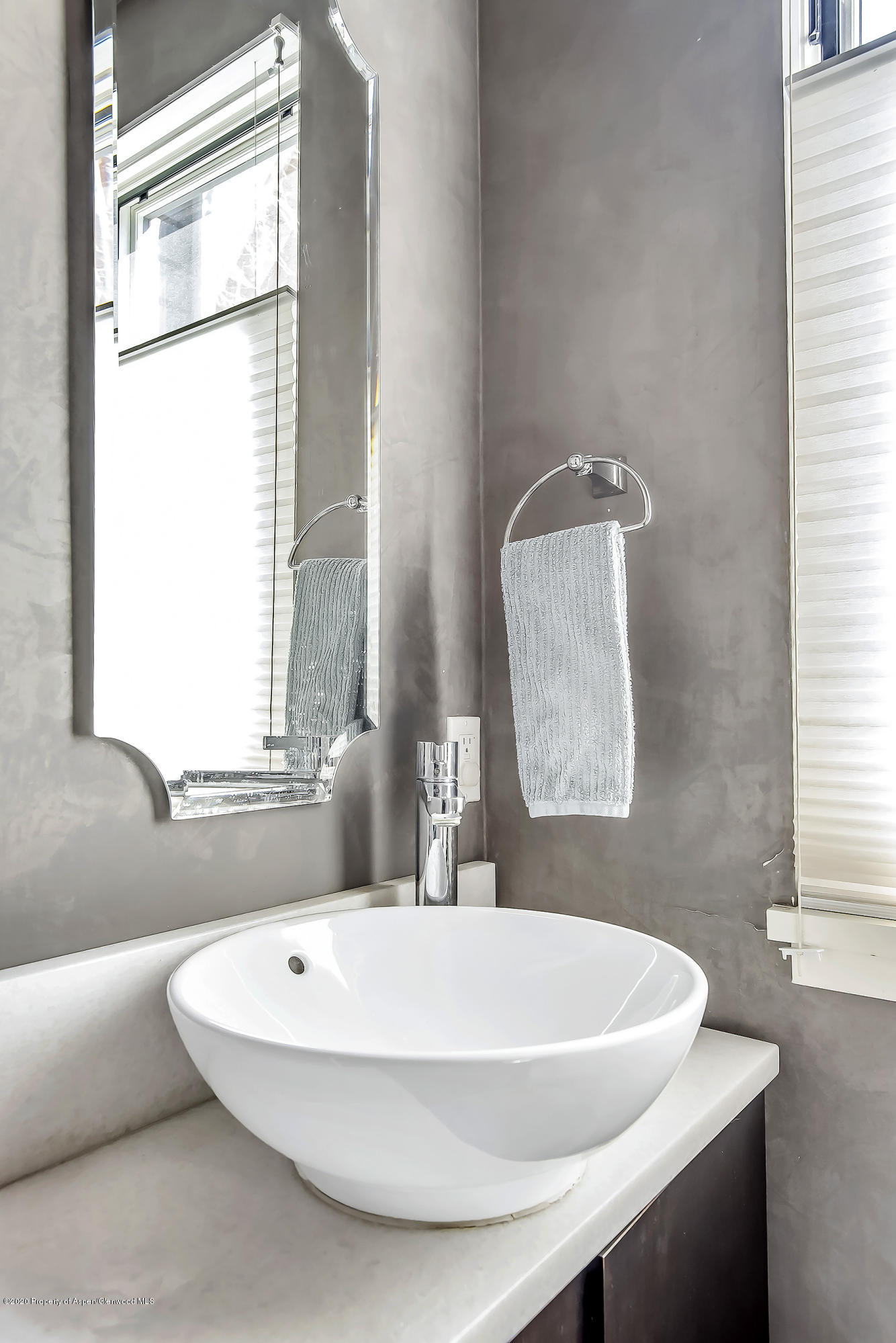 80 Riverdown Drive Aspen, CO 81611 - Photo 22 of 31 a white bath tub sitting next to a window