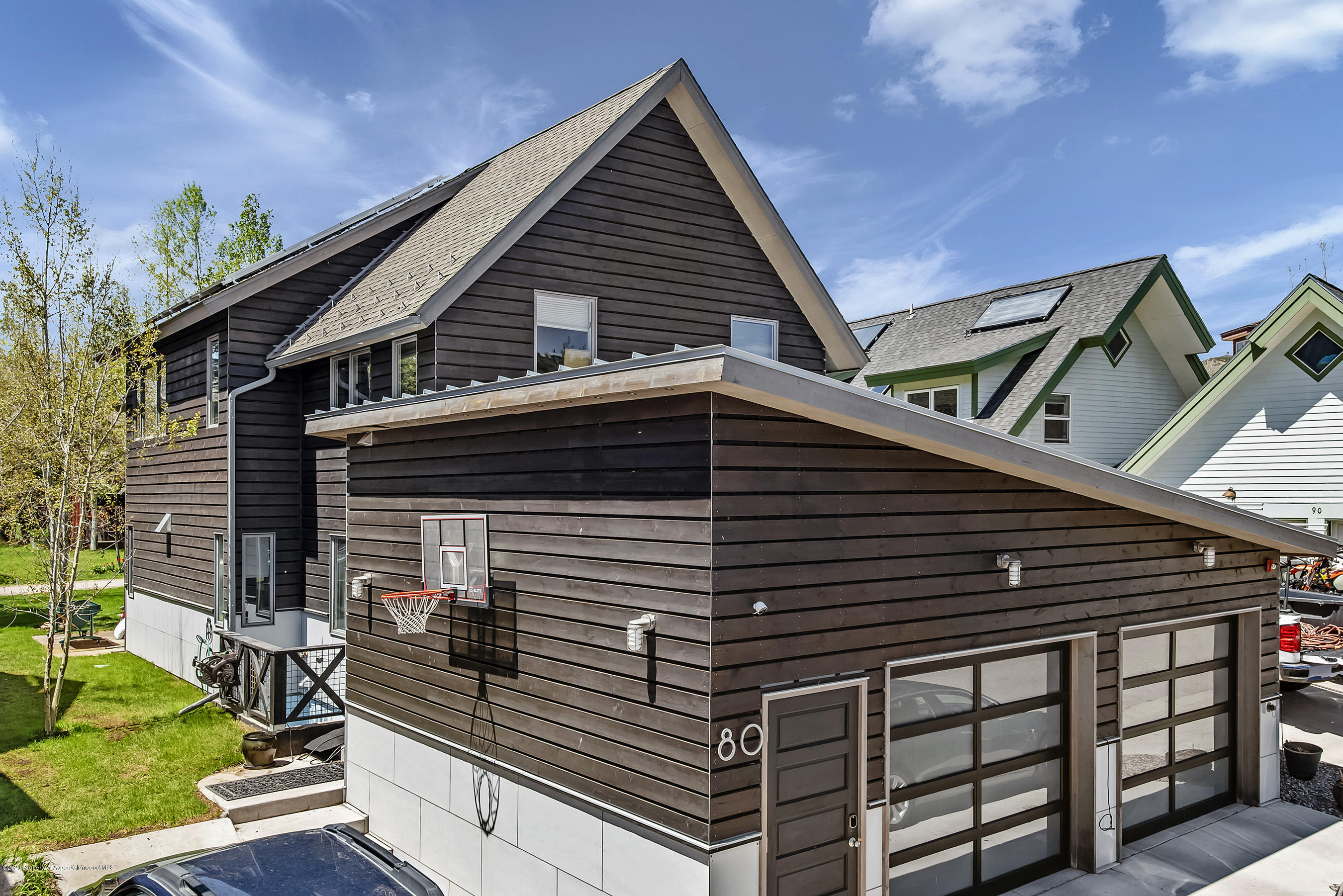 80 Riverdown Drive Aspen, CO 81611 - Photo 28 of 31 a front view of a house with garage