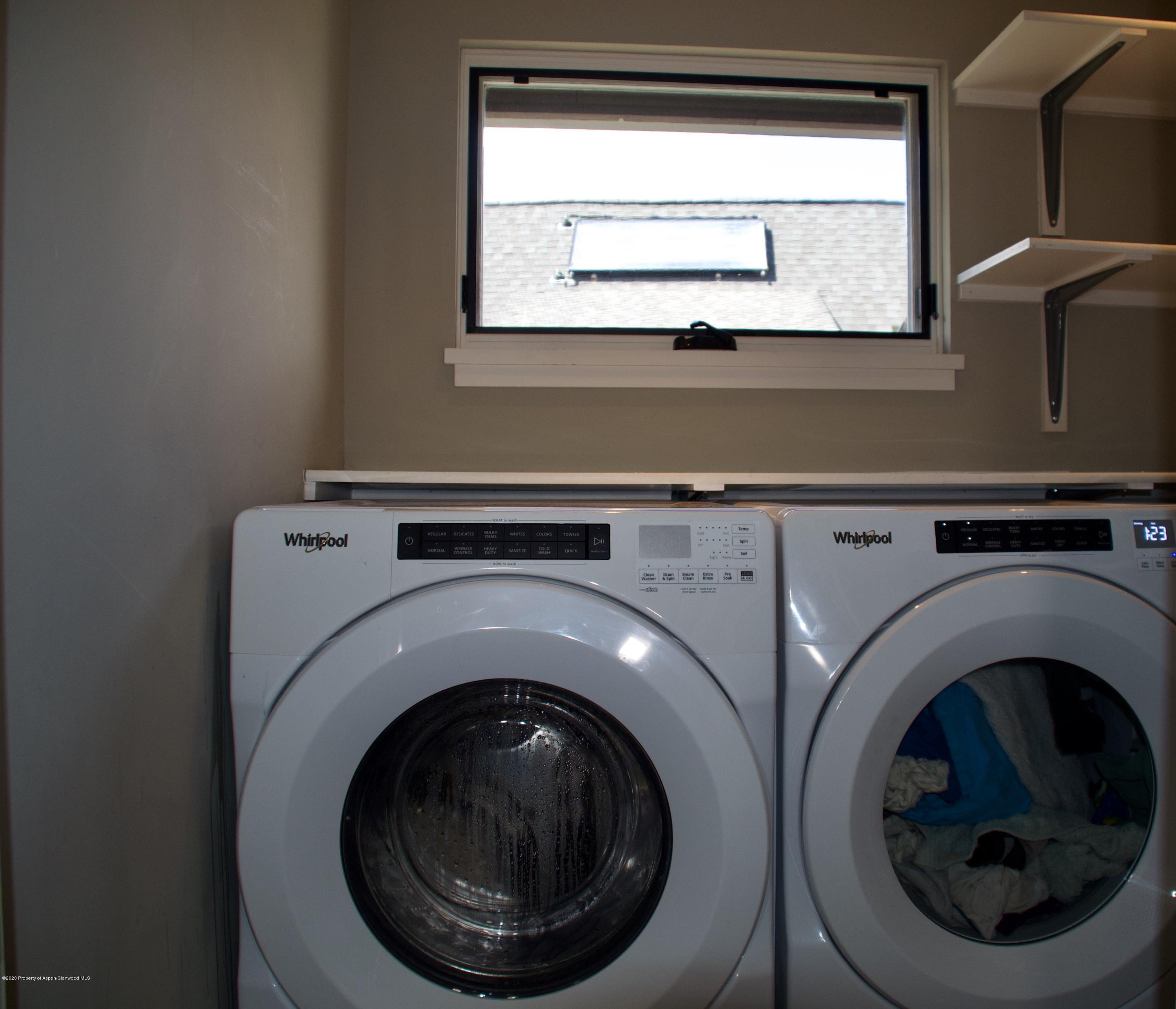 80 Riverdown Drive Aspen, CO 81611 - Photo 31 of 31 a utility room with dryer and washer