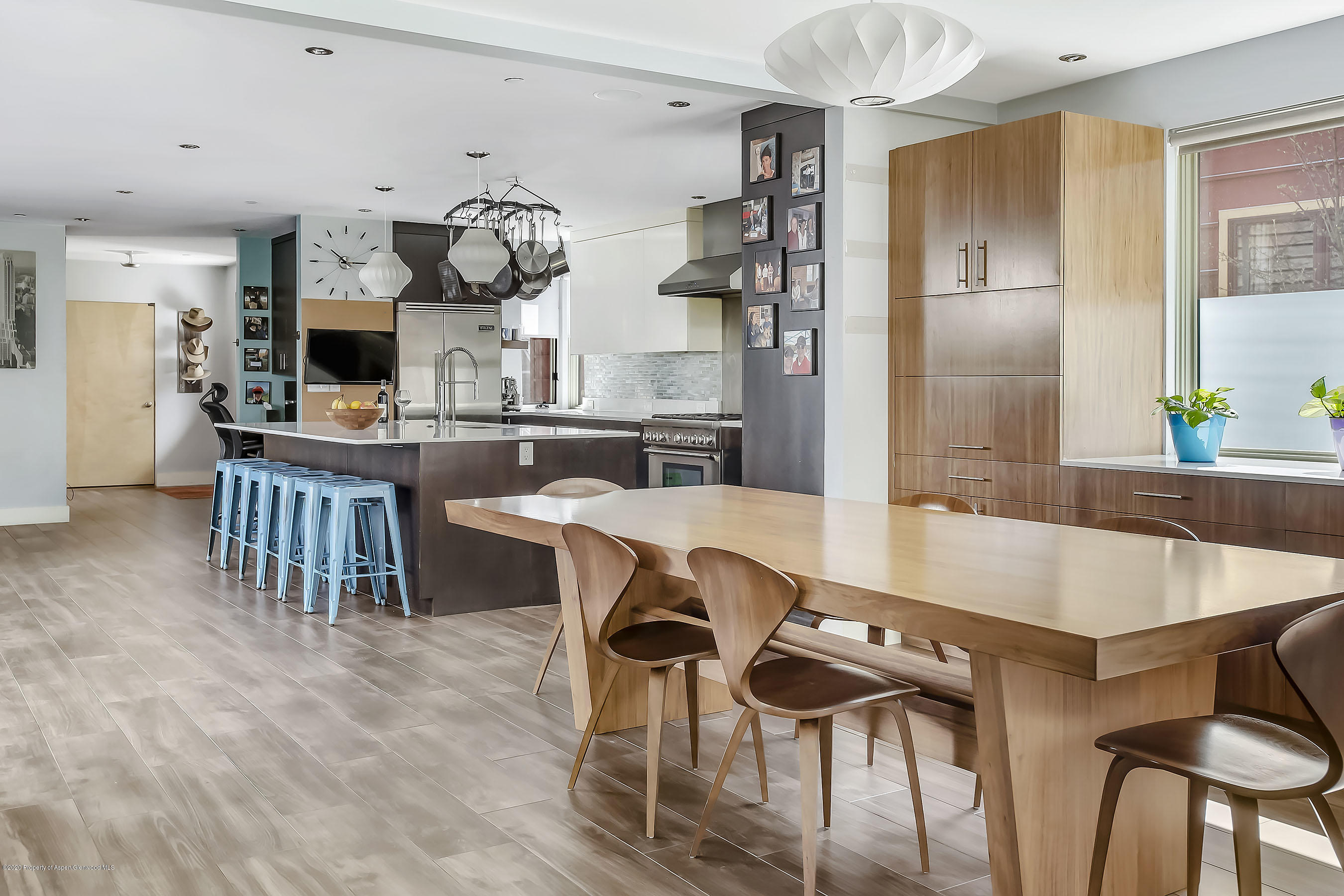 80 Riverdown Drive Aspen, CO 81611 - Photo 4 of 31 a kitchen with a table and chairs in it