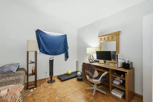 a view of a workspace with furniture