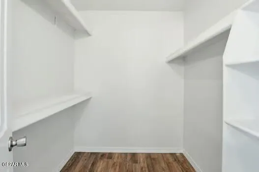 a view of small space with racks on the wall