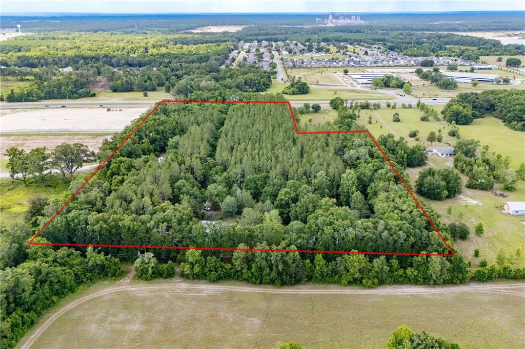 23227 West Newberry Road Newberry, FL 32669 - Photo 16 of 30 a view of a green field with lots of green space