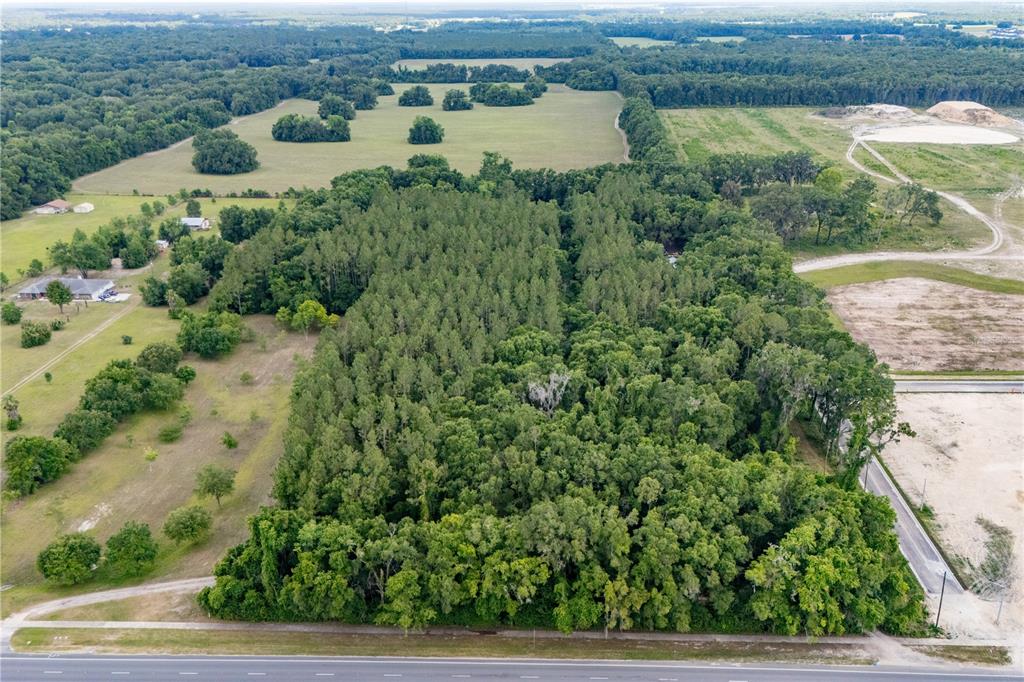 23227 West Newberry Road Newberry, FL 32669 - Photo 5 of 30 an aerial view of a house with a yard and lake view