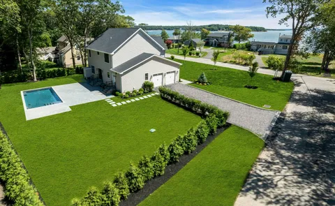a view of a house with a big yard