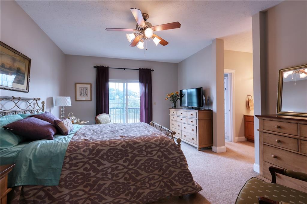 668 Riverside Drive Beaver, PA 15009 - Photo 17 of 25 The main bedroom is serene, restful and streaming with natural light from your veranda.