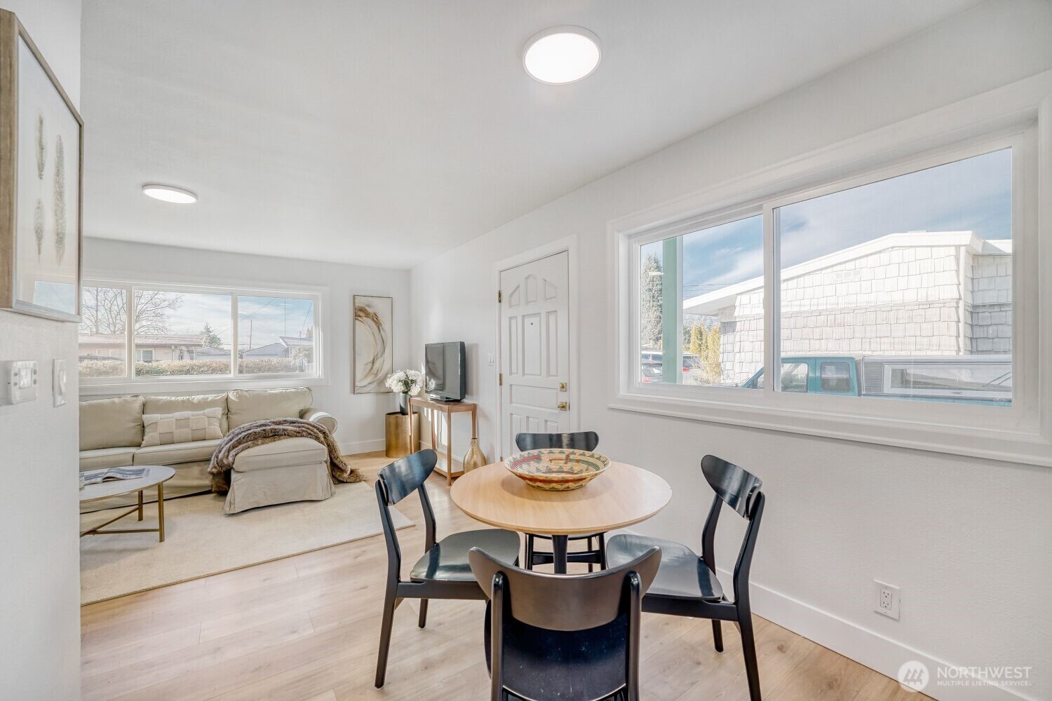 98056-768 Dayton Avenue Northeast Renton, WA 98056 - Photo 14 of 27 a view of a dining room with furniture and window