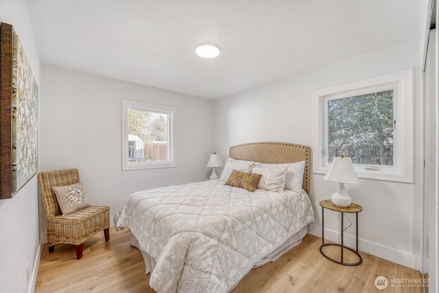 98056-768 Dayton Avenue Northeast Renton, WA 98056 - Photo 18 of 27 a bedroom with a bed and a window