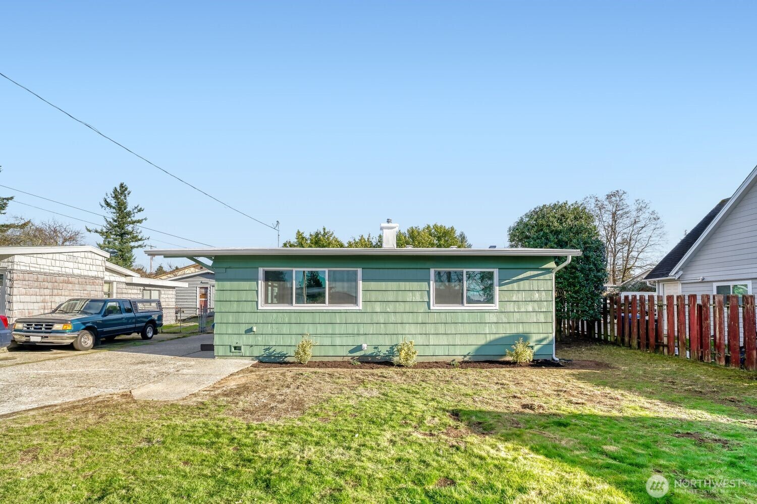 98056-768 Dayton Avenue Northeast Renton, WA 98056 - Photo 2 of 27 a front view of a house with a yard