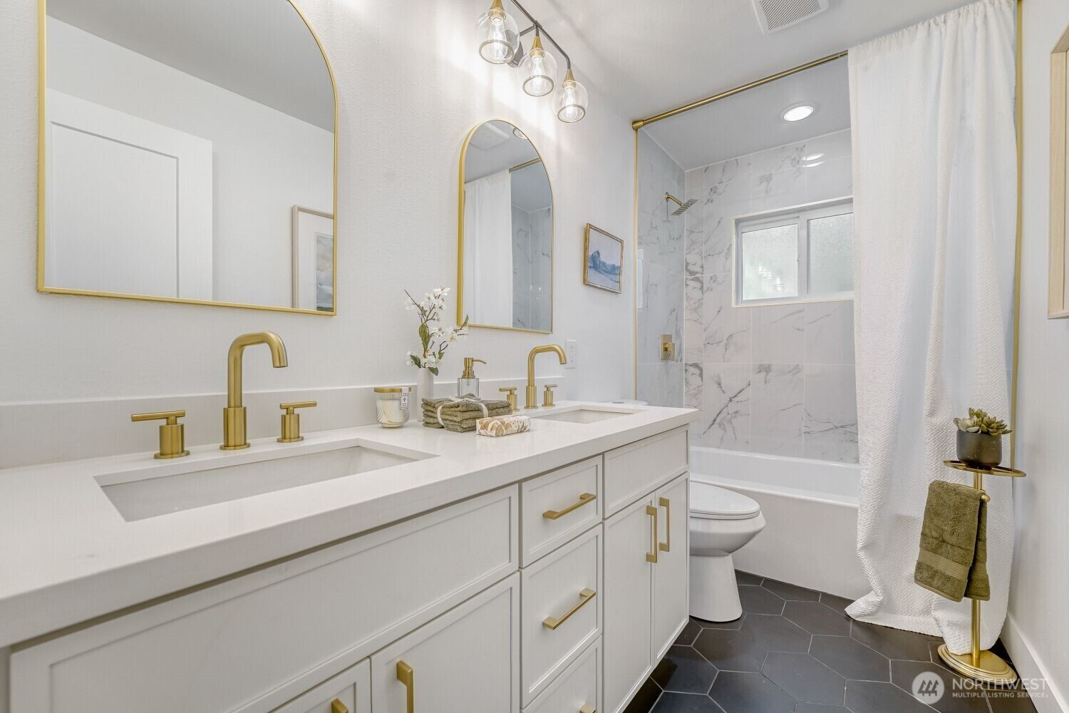 98056-768 Dayton Avenue Northeast Renton, WA 98056 - Photo 22 of 27 a bathroom with a double vanity sink mirror and bathtub