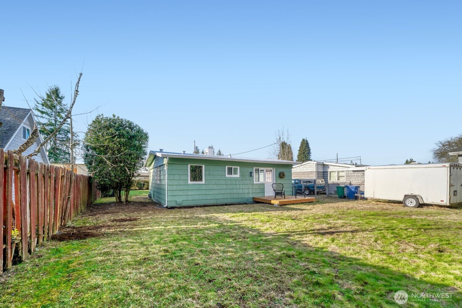 98056-768 Dayton Avenue Northeast Renton, WA 98056 - Photo 24 of 27 a view of a house with a yard