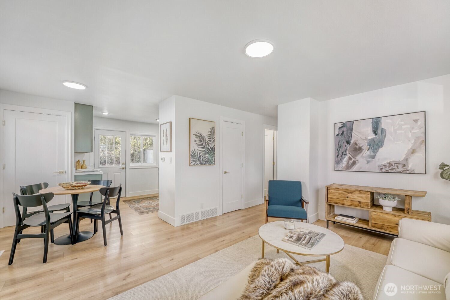 98056-768 Dayton Avenue Northeast Renton, WA 98056 - Photo 7 of 27 a living room with furniture and a wooden floor