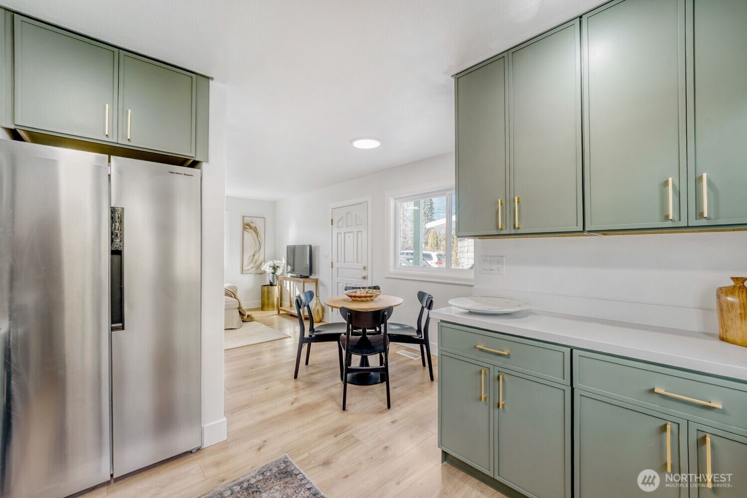 98056-768 Dayton Avenue Northeast Renton, WA 98056 - Photo 10 of 27 a kitchen with a sink cabinets and appliances