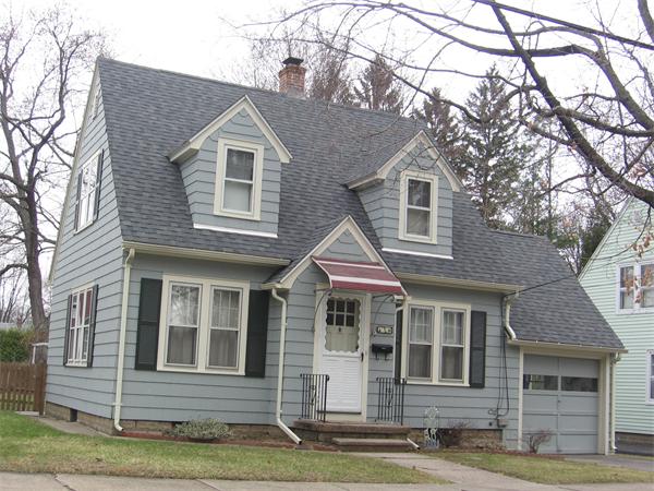 8 Ashbrook Street Springfield, MA 01118 - Photo 1 of 1 a front view of a house with a yard