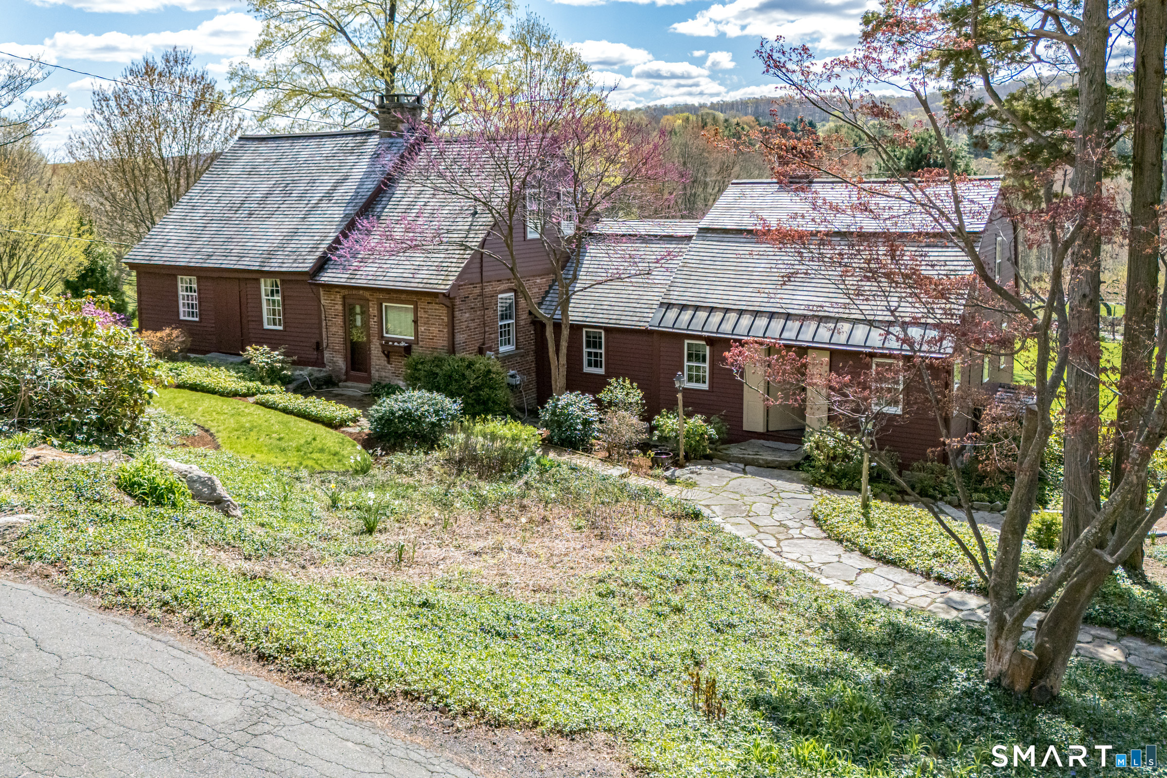 29 Spencer Road Haddam, CT 06441 - Photo 1 of 40 a front view of a house with garden