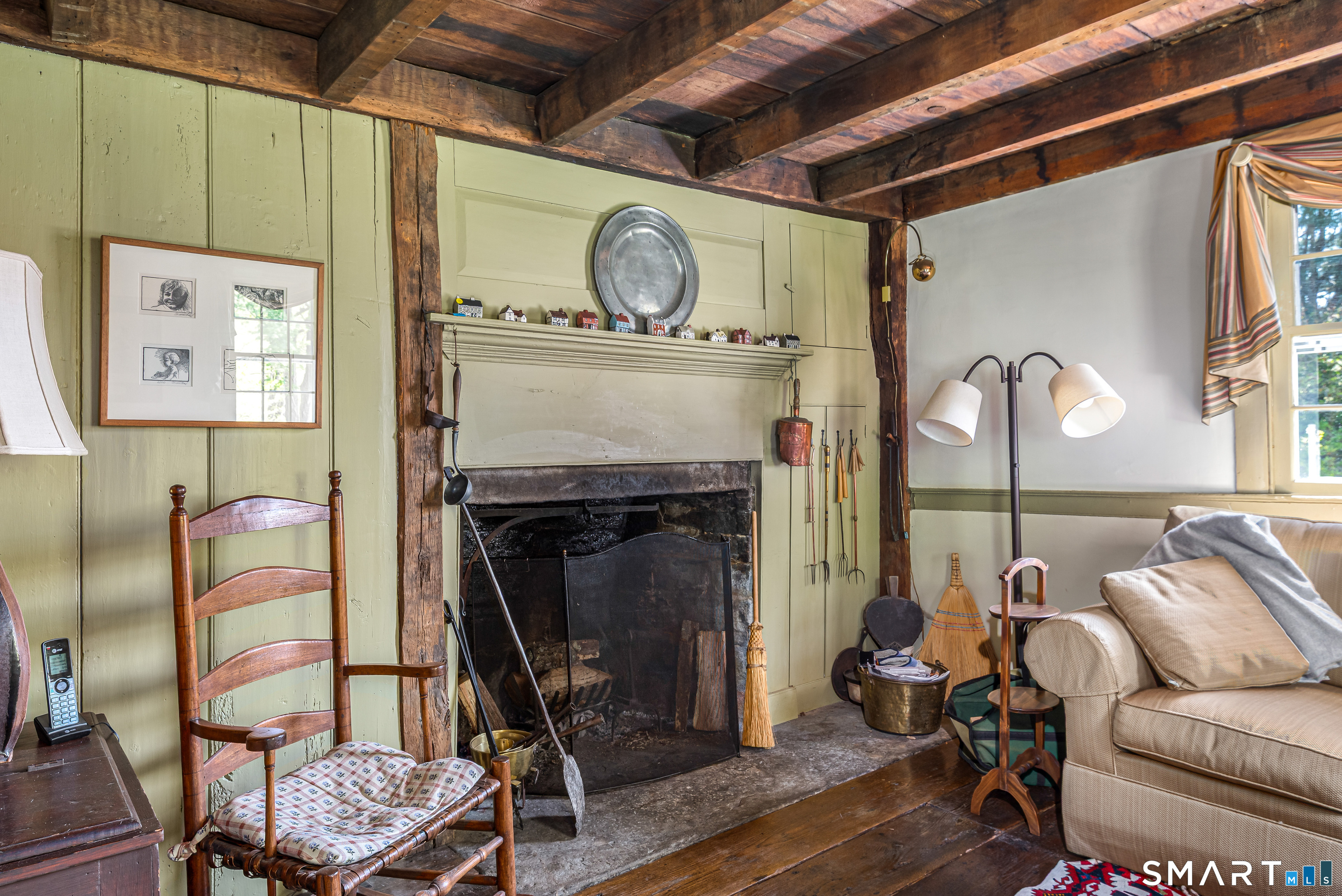 29 Spencer Road Haddam, CT 06441 - Photo 19 of 40 a living room with furniture and a fireplace
