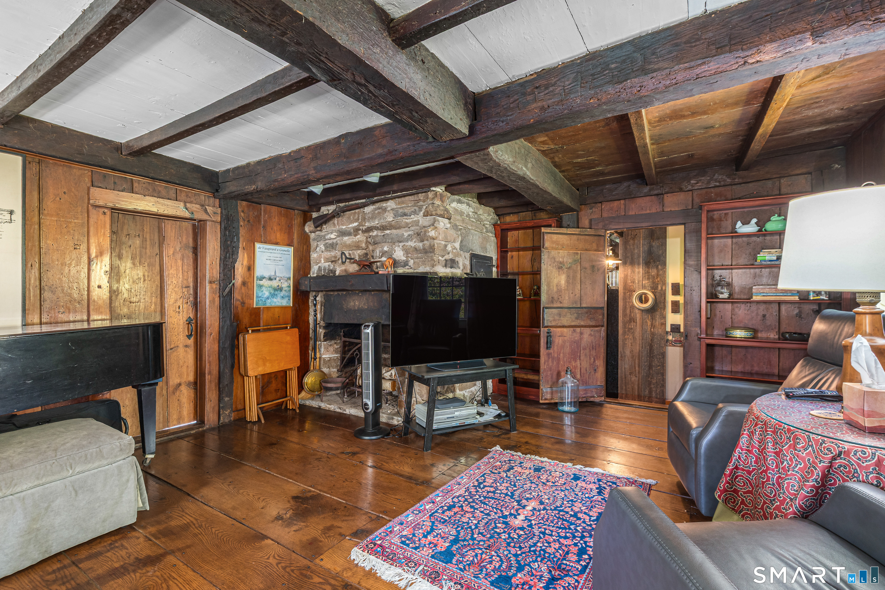 29 Spencer Road Haddam, CT 06441 - Photo 23 of 40 a living room with furniture and a flat screen tv