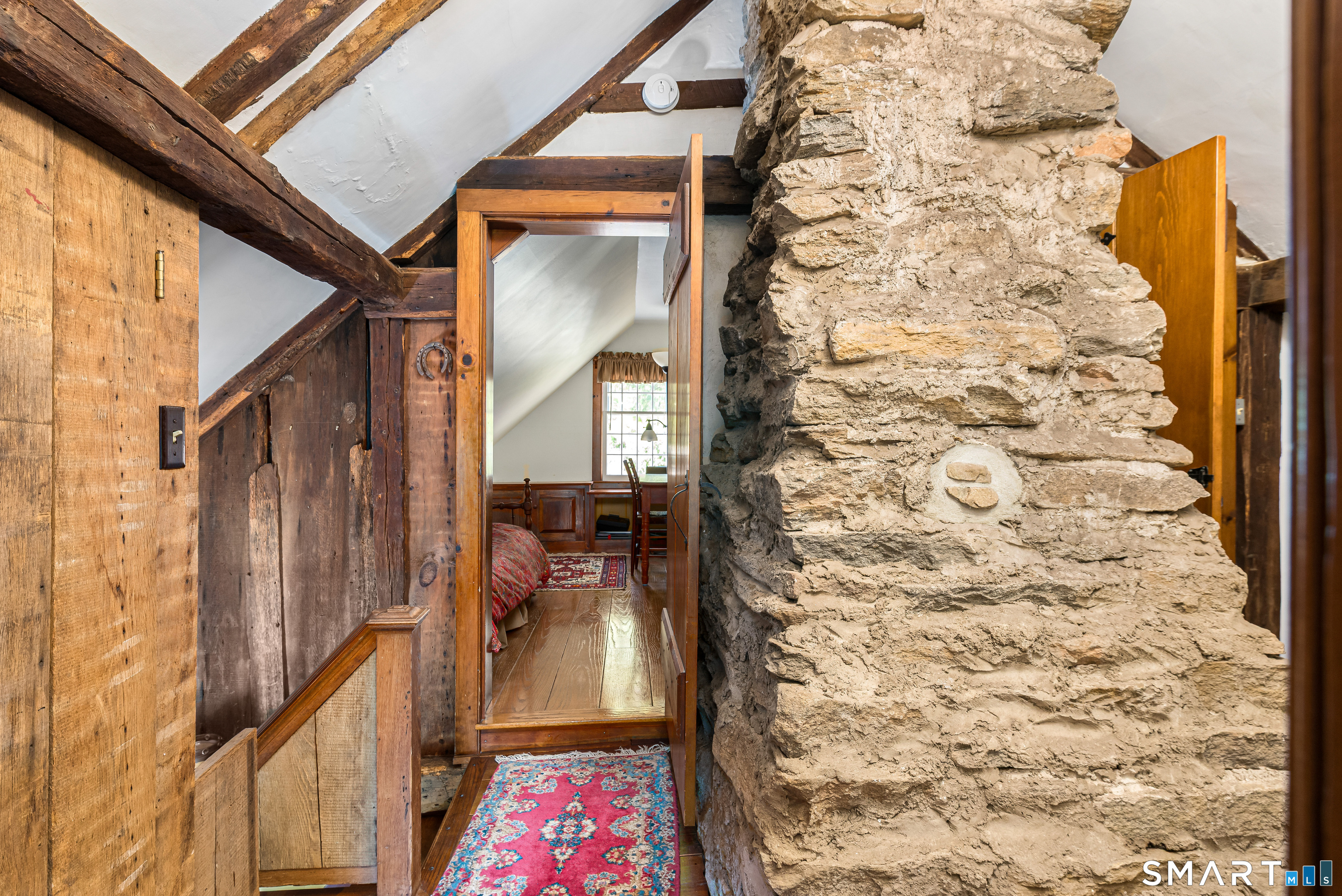 29 Spencer Road Haddam, CT 06441 - Photo 26 of 40 a view of hallway with a door and mirror