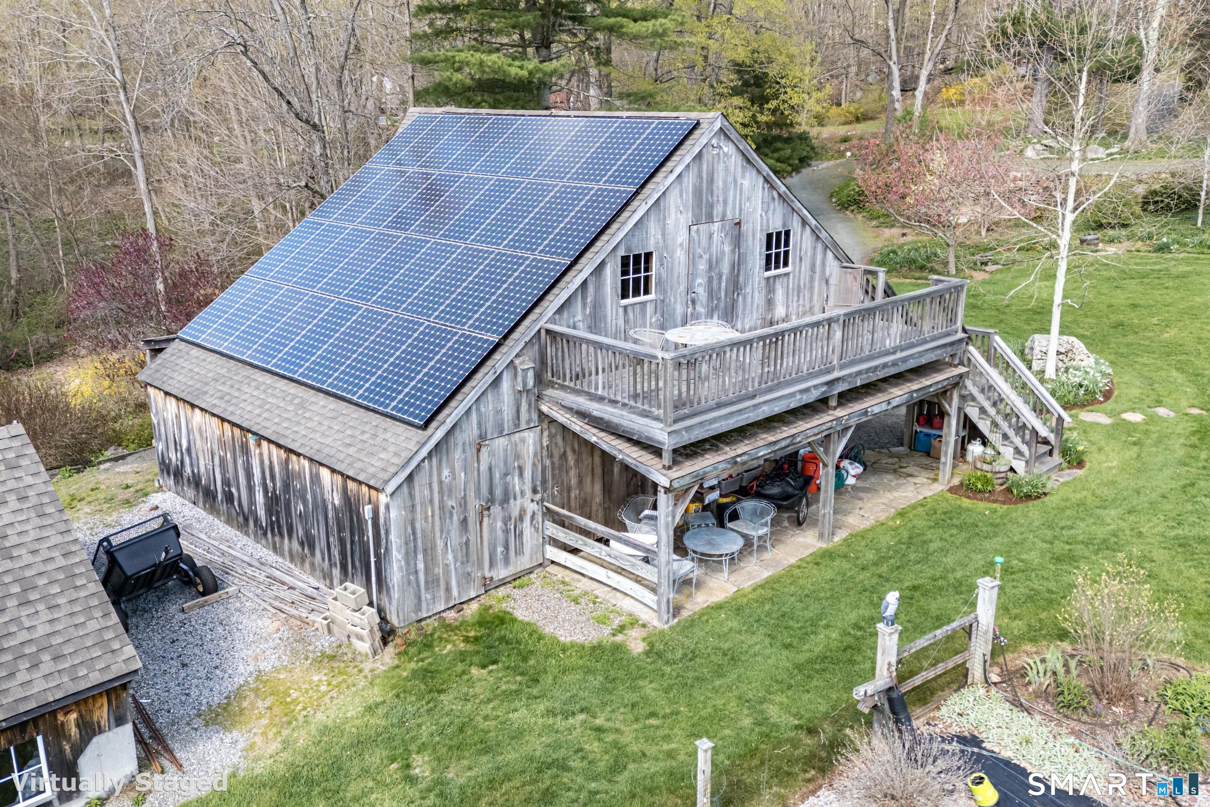 29 Spencer Road Haddam, CT 06441 - Photo 33 of 40 a aerial view of a house with a yard and deck